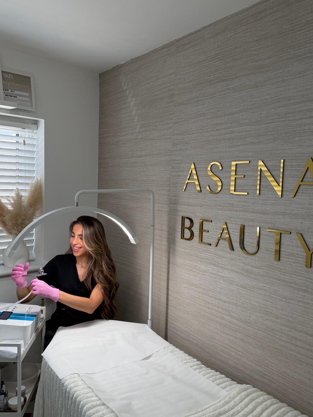 Asena at work in her private beauty studio in Cuffley